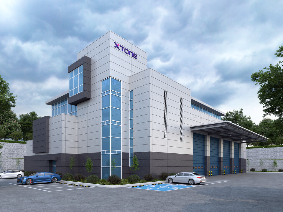 스톤 엠보스로 시공한 건축물 이미지.<KG스틸>